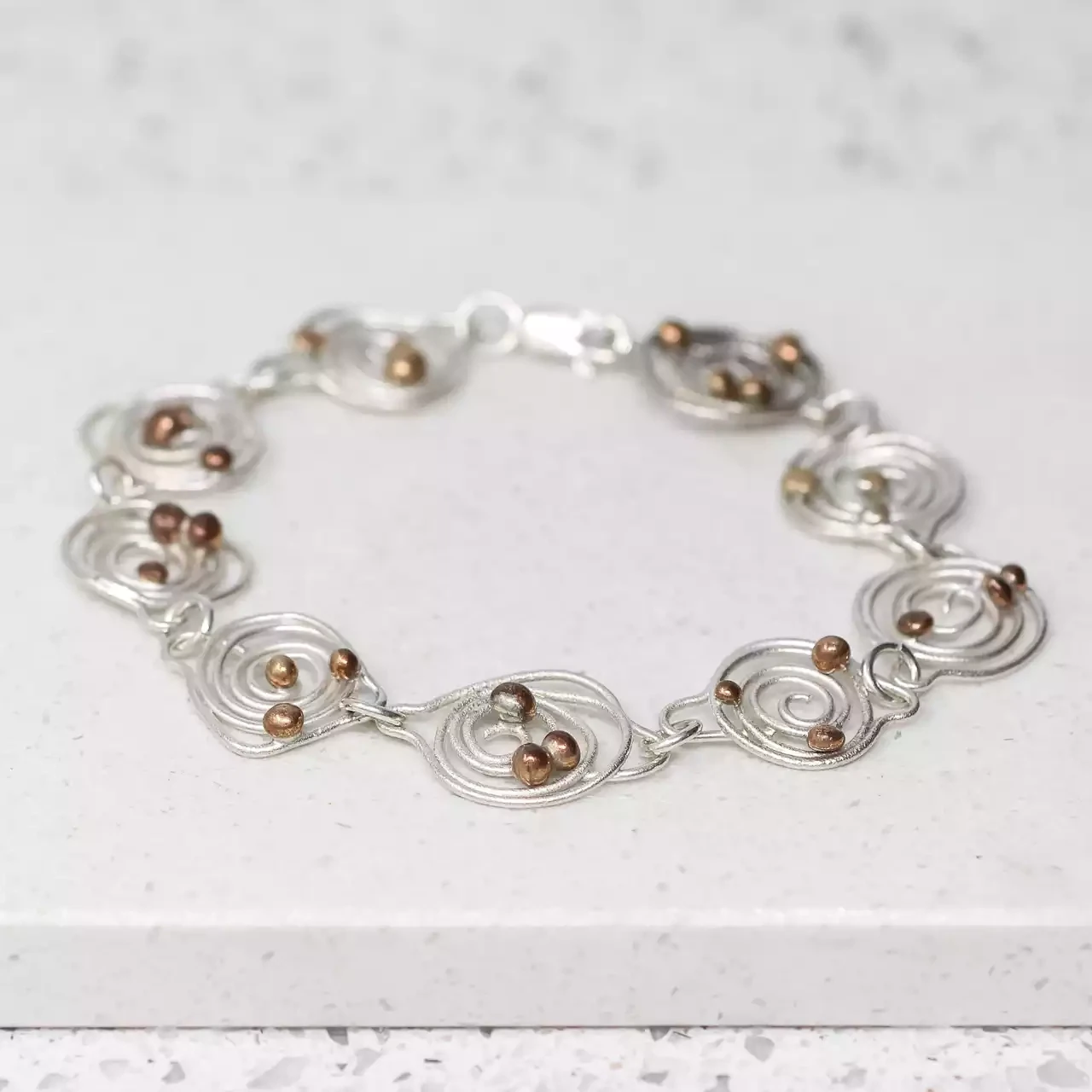 Squiggle Silver and Bronze Bracelet by Xuella Arnold