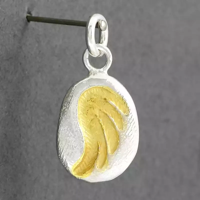 Stamped Wing Silver and Gold Plate Charm by Fi Mehra