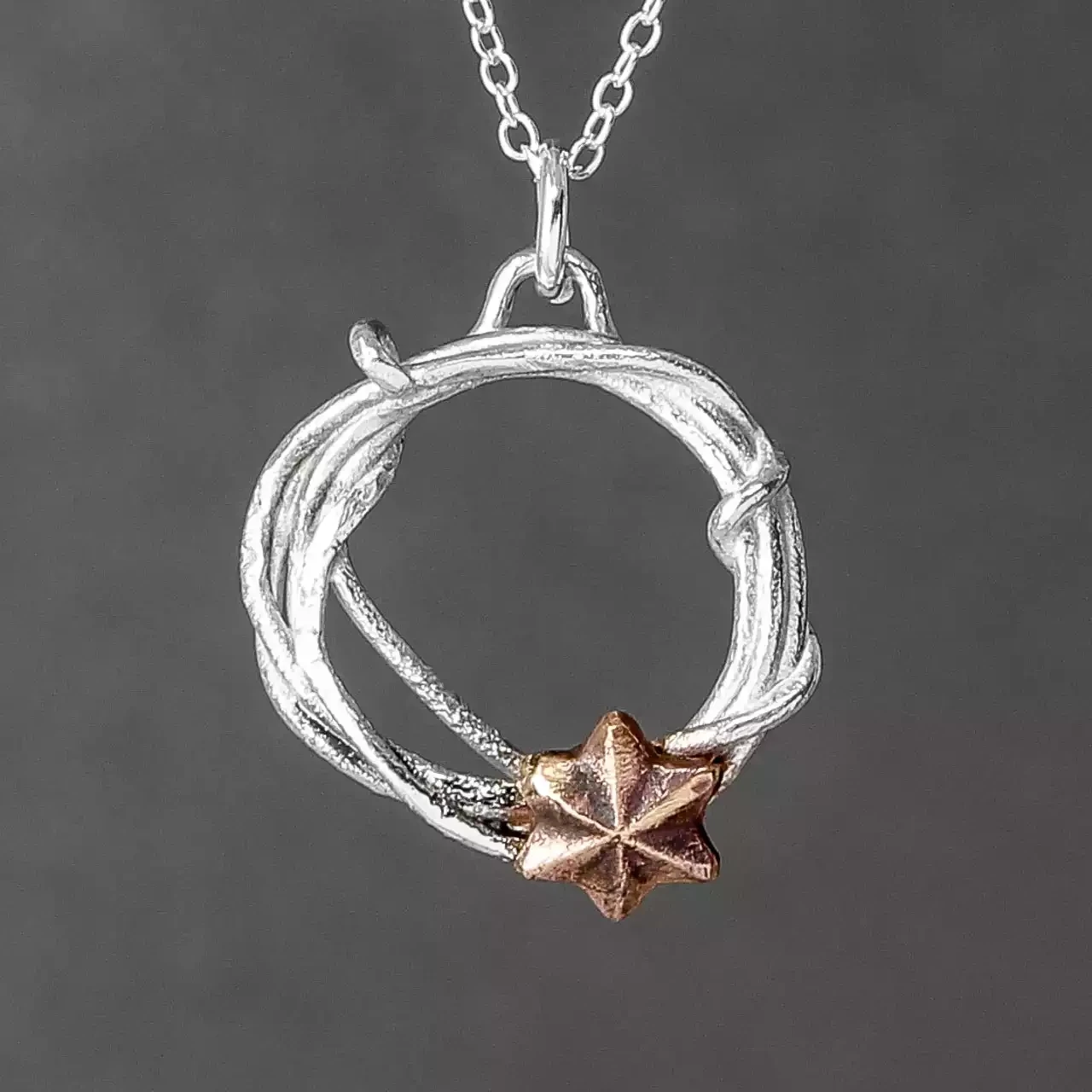 Star Silver and Bronze Pendant by Xuella Arnold