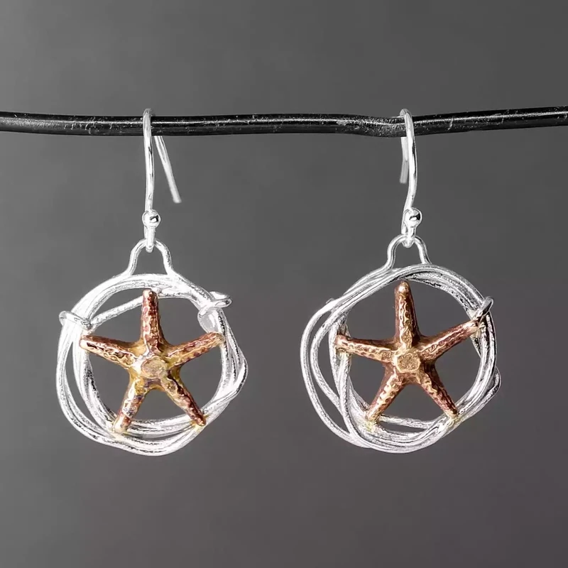 Starfish in Hoop Silver and Bronze Earrings by Xuella Arnold