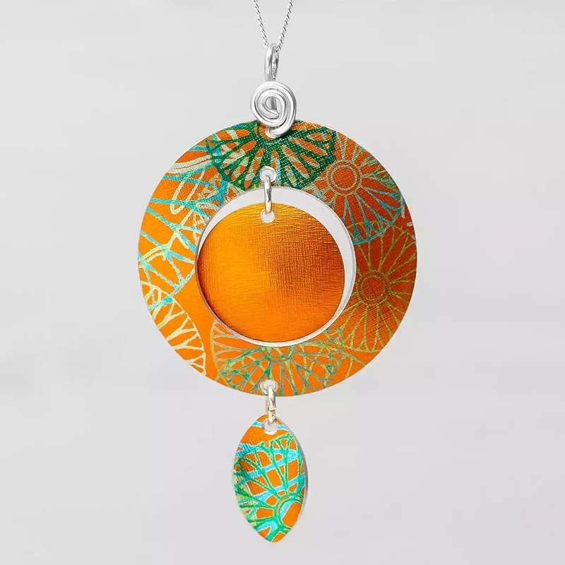Sundial Circles and Leaf Pendant by Hazel Atkinson
