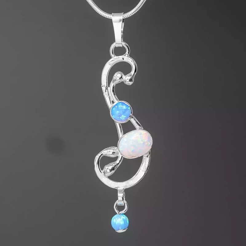 Swirl Silver Pendant With Blue and White Opalites by Lavan