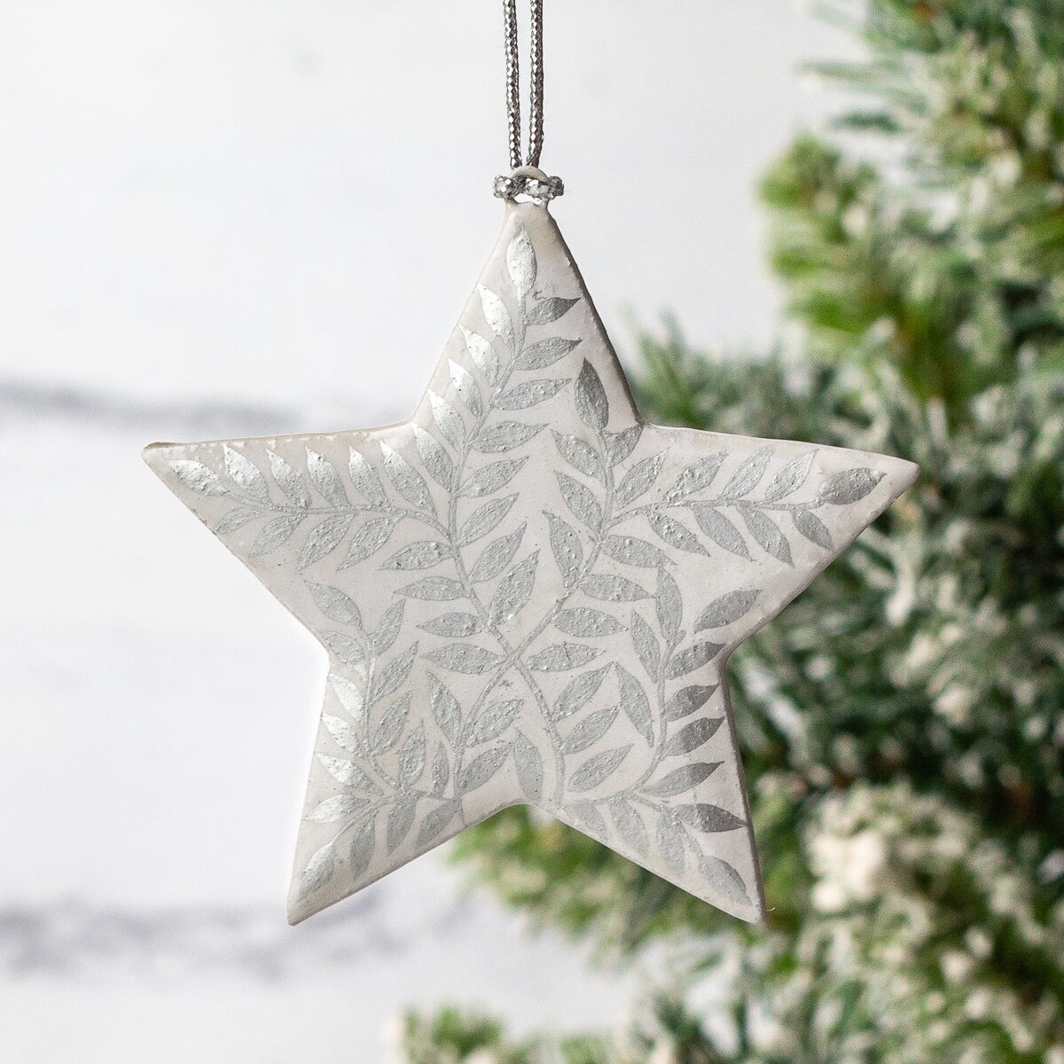 Hand Painted Papier Mâché Star Decoration - White Leaves on Silver Small by Fair to Trade