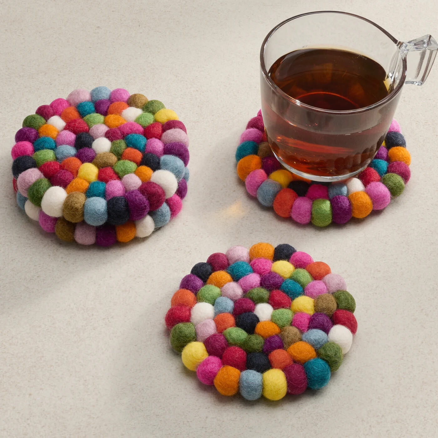 Felt Ball Four Piece Round 4&quot; Diameter Coaster Set Multicolour