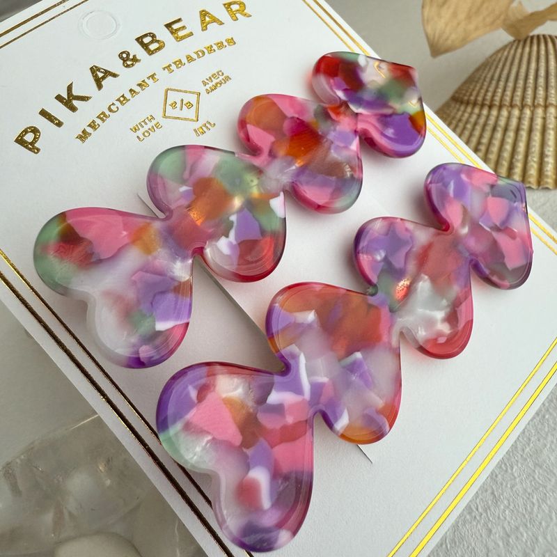 &quot;Love Is A Battlefield&quot; Quadruple Heart Hair Clips Burano