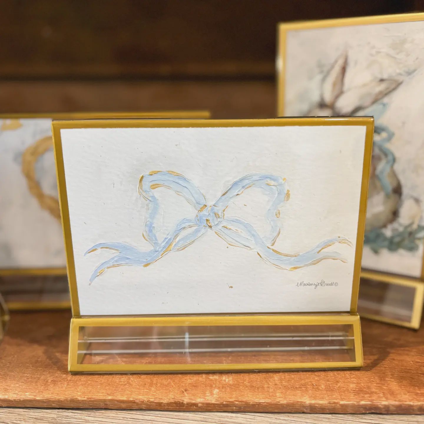 Mackenzie Kissel Art ‘French Blue Bow&#39; in Acrylic Gold Frame Easter 4x6