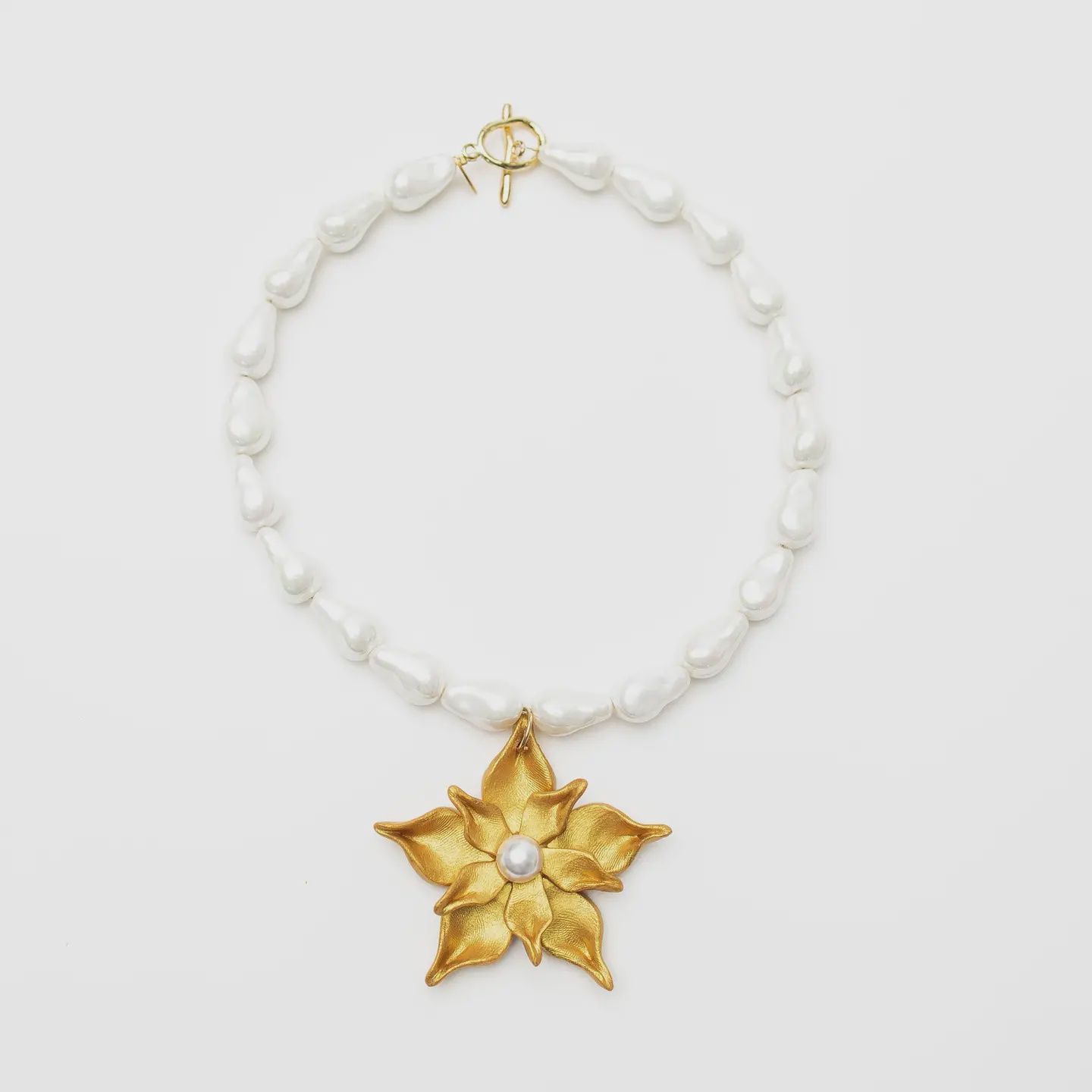 Hidden Truth Freshwater Teardrop Pearls with Double Stargazer Lily Blossom