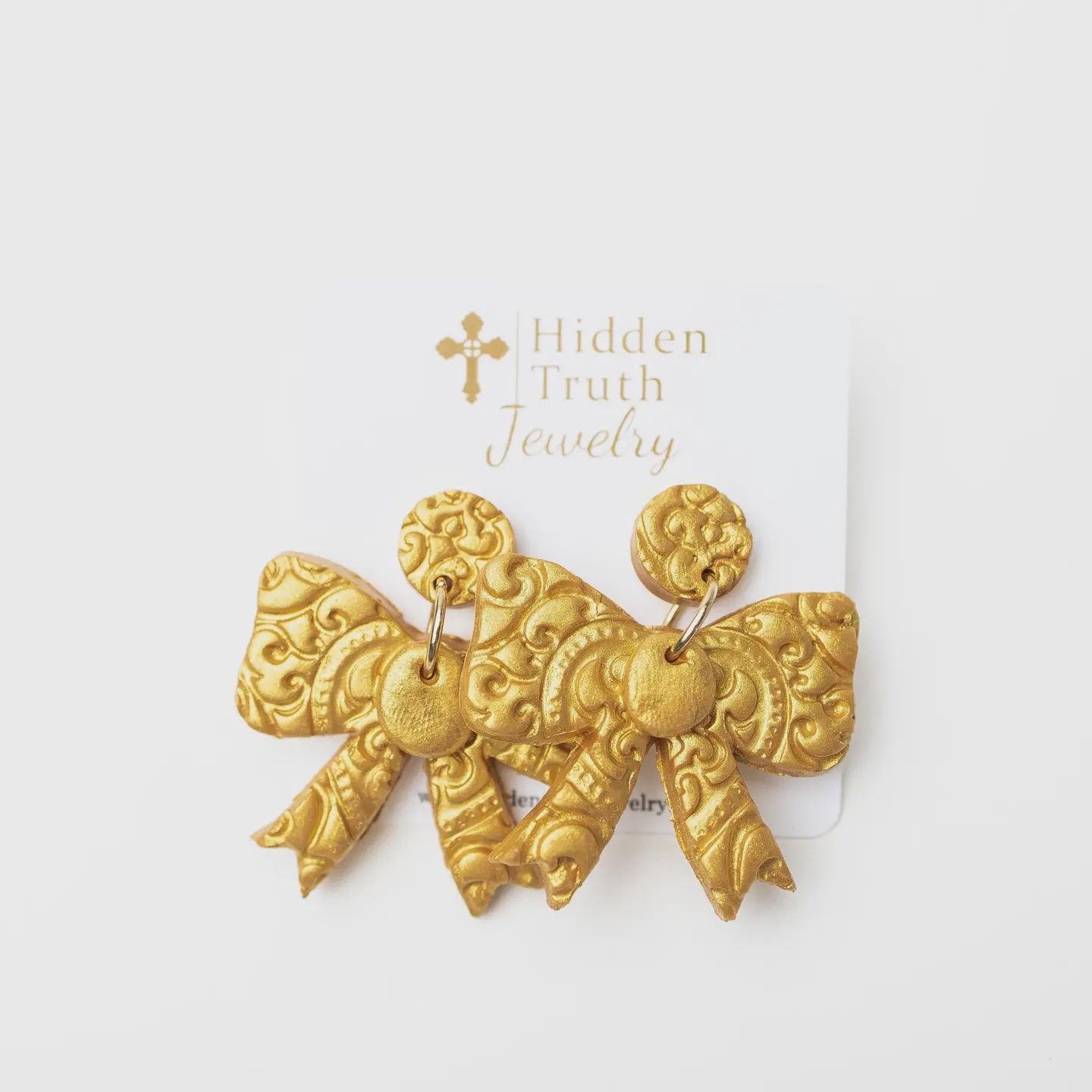 Hidden Truth Jewelry Bow Dangles