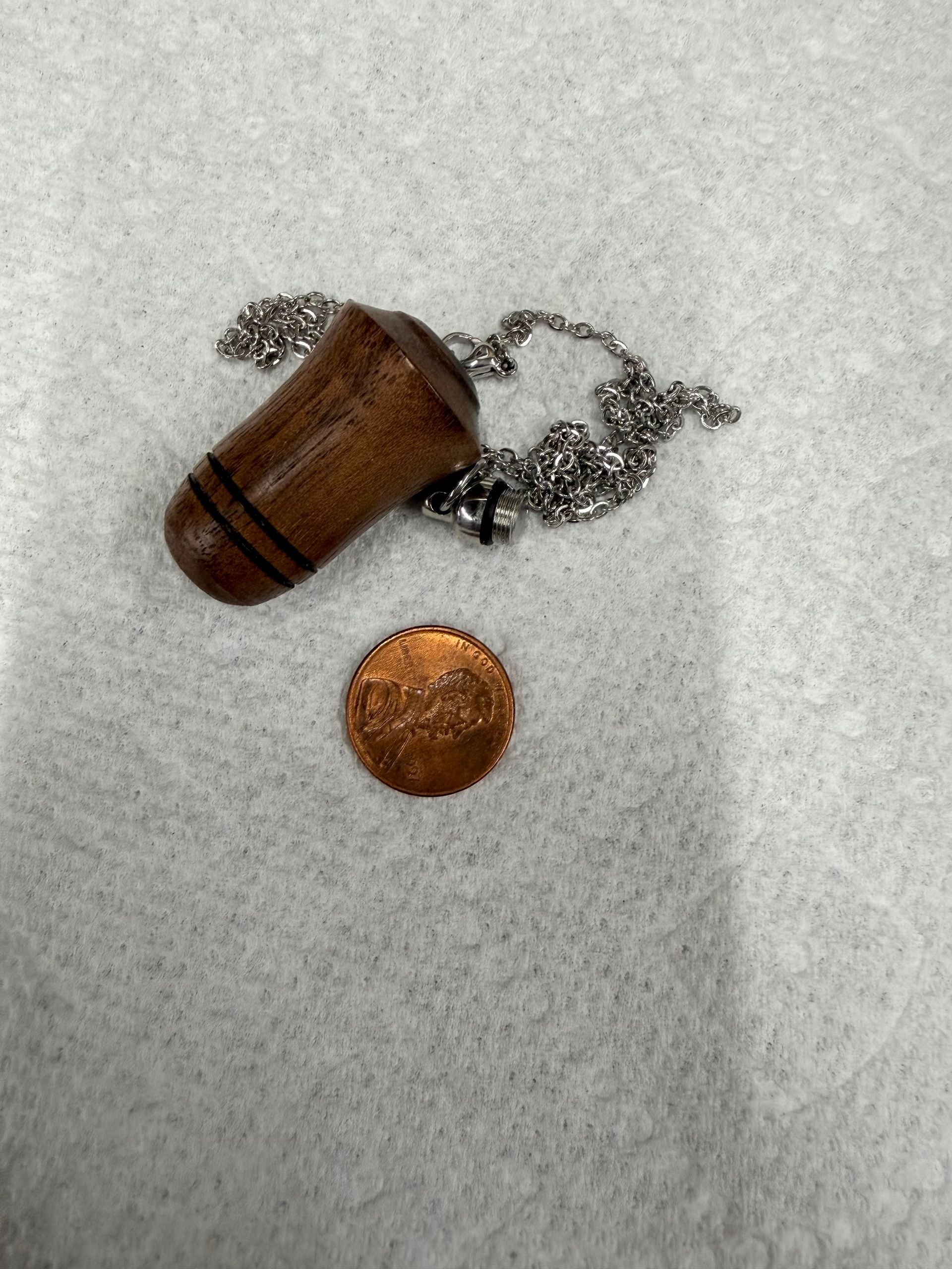 (Walnut).  Keepsake Ash necklace ,1 3/4
