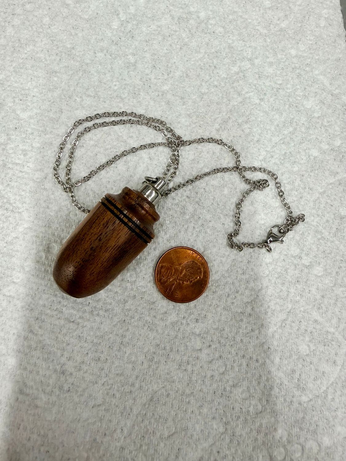 Walnut wood keepsake necklace (2" x 13/16")