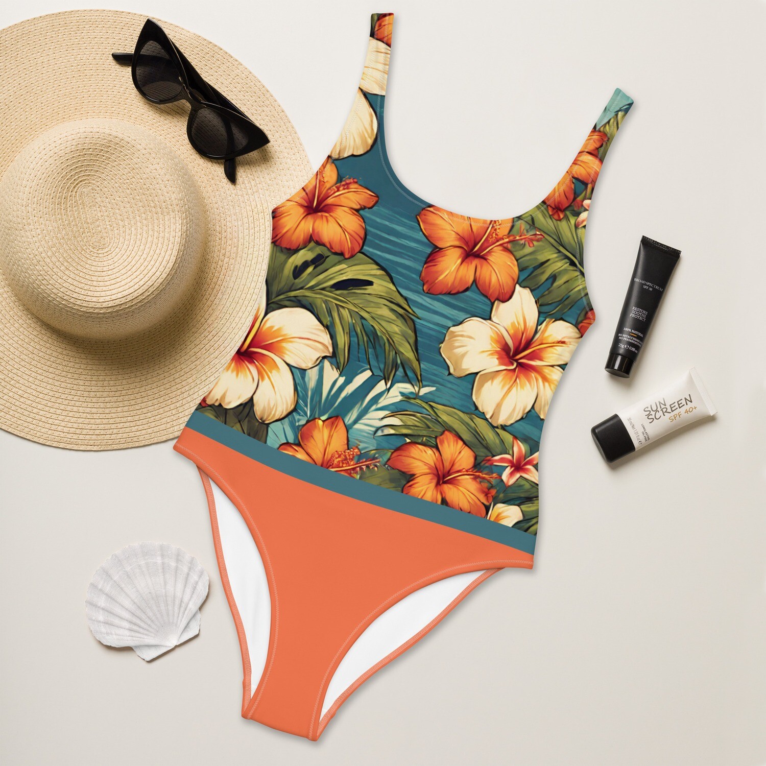 Orange one-piece swimsuit with Hawaiian hibiscus blossoms in sizes XS-3XL
