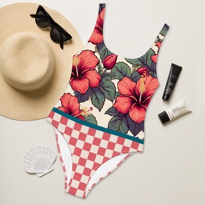 Interesting retro checkered one-piece swimsuit with Hawaiian hibiscus blossom details on the front in sizes XS-3XL
