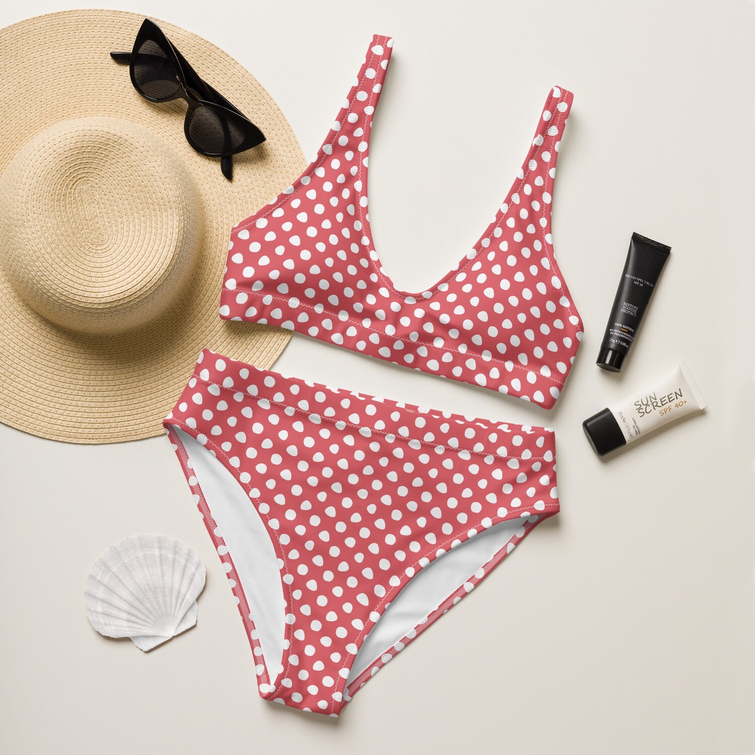Retro red recycled high-waisted bikini with white polka dots in sizes XS-3XL