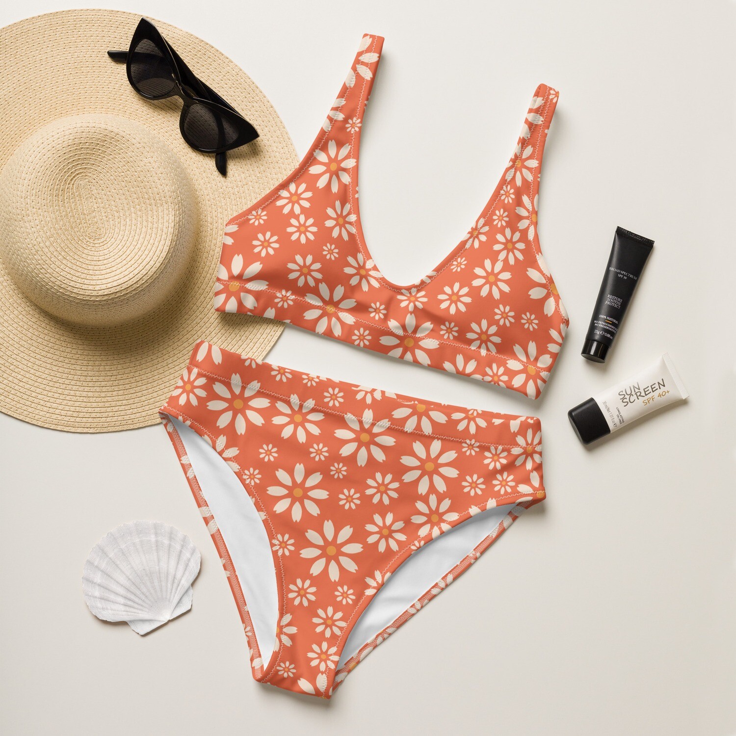 Orange recycled high-waisted bikini set with retro daisy pattern in sizes XS-3XL