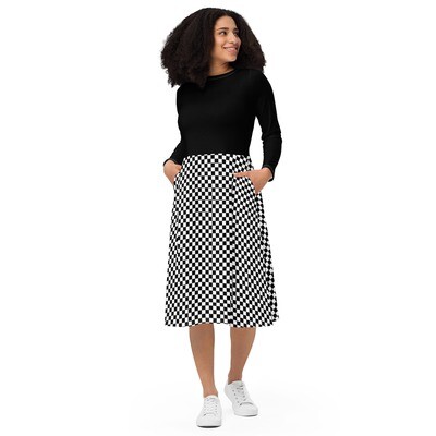 Black long sleeve midi dress with checkered pattern on the bottom half
