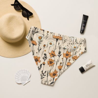 Retro yellow high-waisted bikini bottom with retro flowers