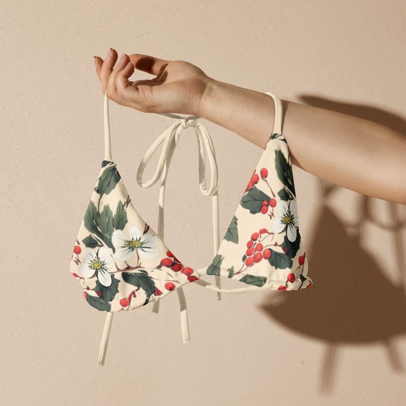 Retro yellow string bikini top with forest flowers and wild berries.
