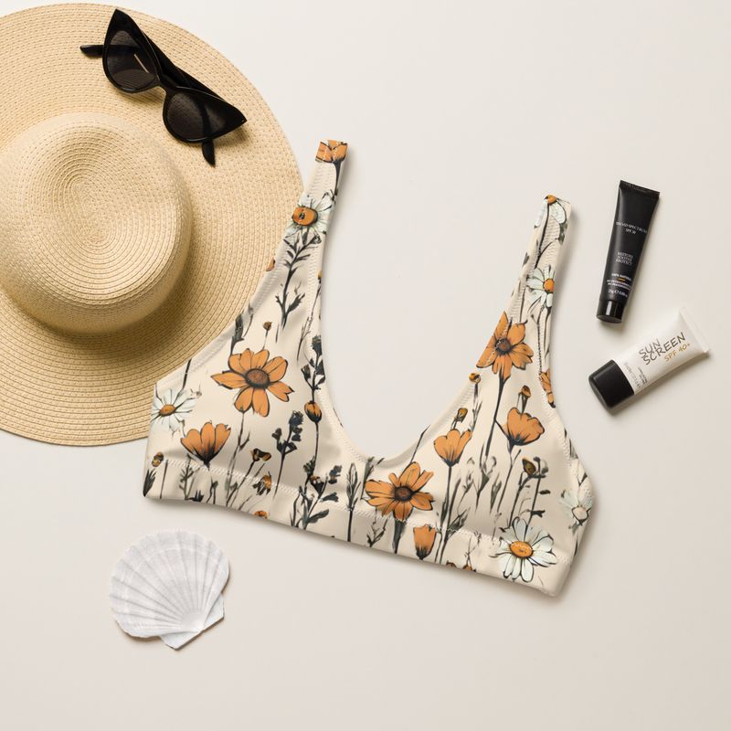 A retro yellow padded bikini top with retro flowers is a perfect boho chic bikini top. The padding is removable. Sizes from XS to 3XL.