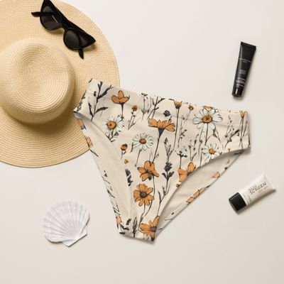 Retro yellow high-waisted bikini bottom with retro flowers. Lining is retro yellow. Sizes up to 3XL.