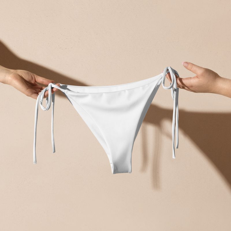 White string bikini bottoms are lined with white lining. Great also for bridal showers, bachelorette cruises, etc.