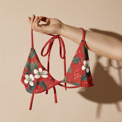 Orange-red triangle bikini top with forest flowers and wild berries.