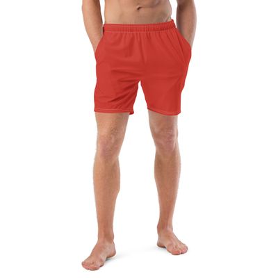 Orange red swim trunks come with pockets and an anti-chafe lining.