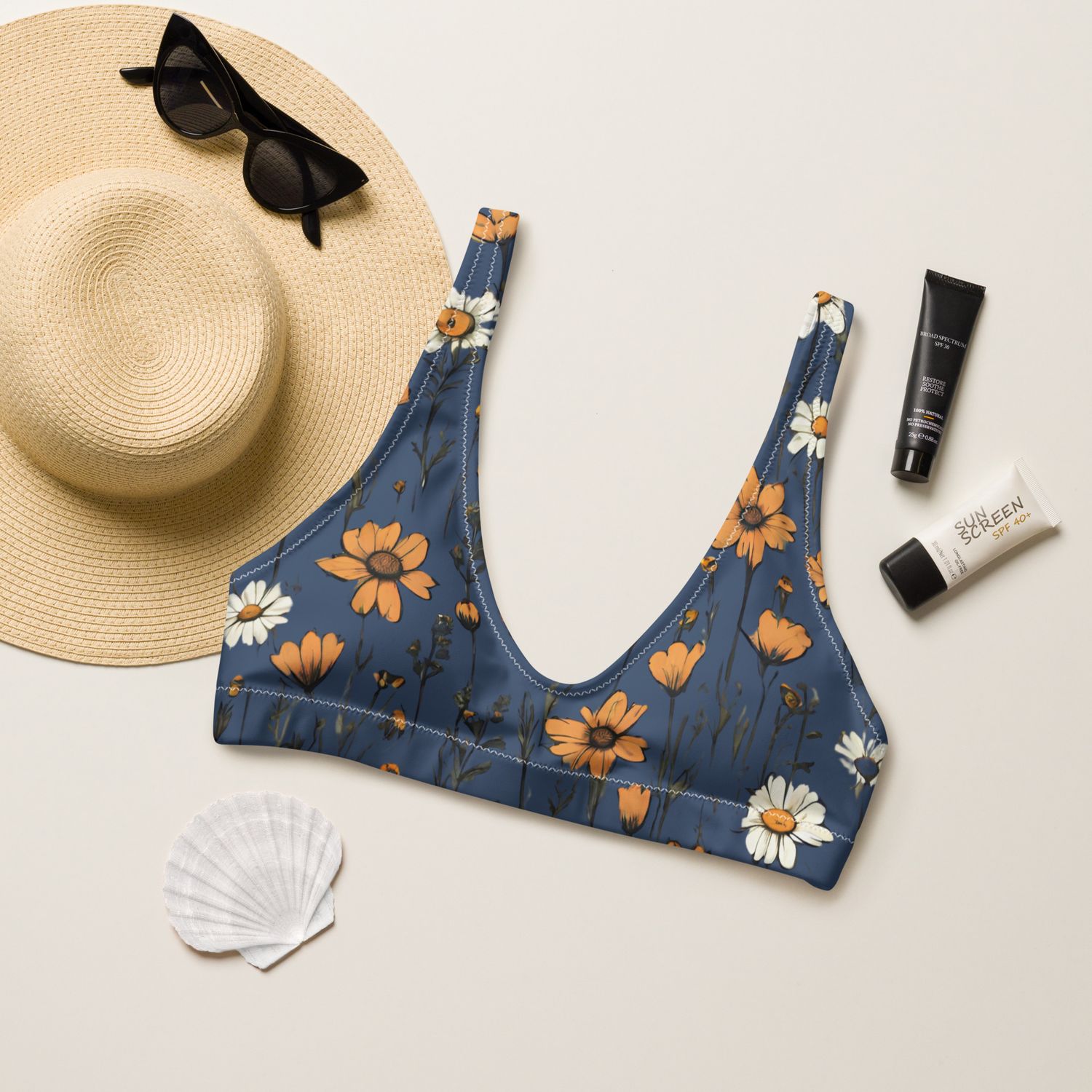 The grey-blue padded bikini top features beautiful retro wildflowers. The lining is grey blue solid color. 