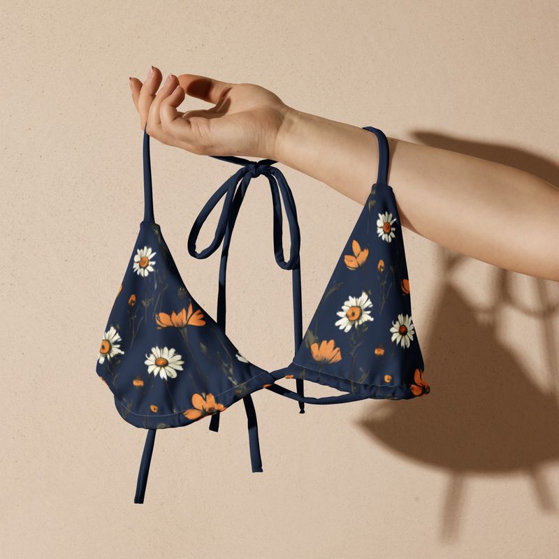 Navy blue triangle bikini top with retro flowers. The lining is navy blue. Sizes up to 3XL.