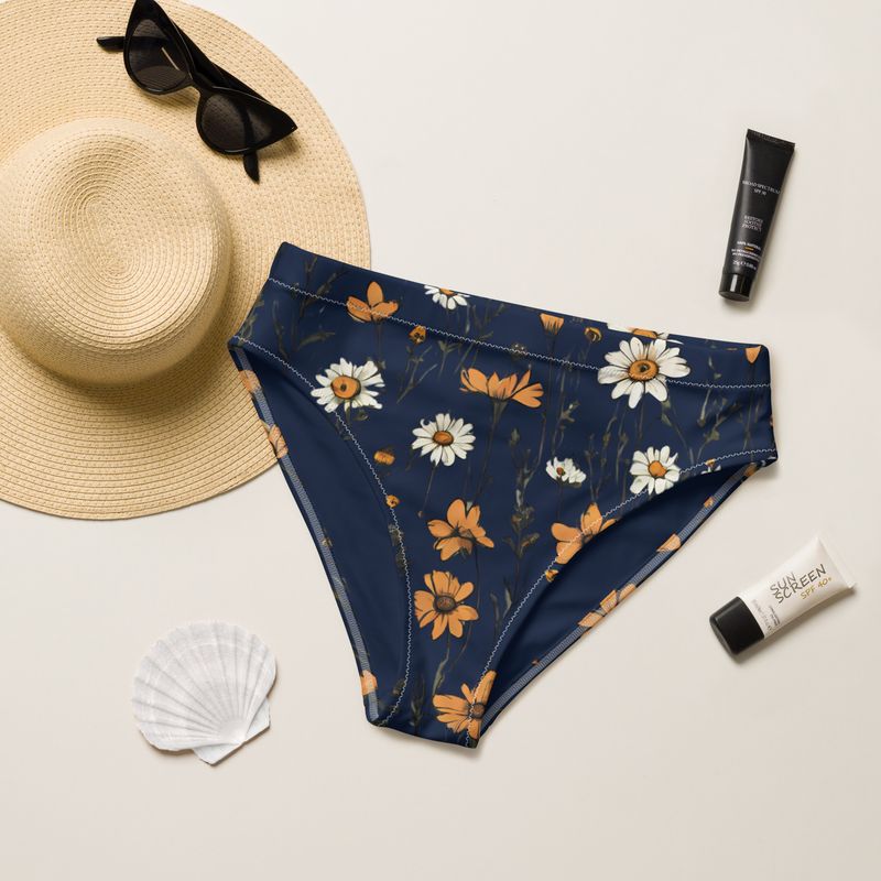 Navy blue high-waisted bikini bottom with retro flowers is flattering on most body types.