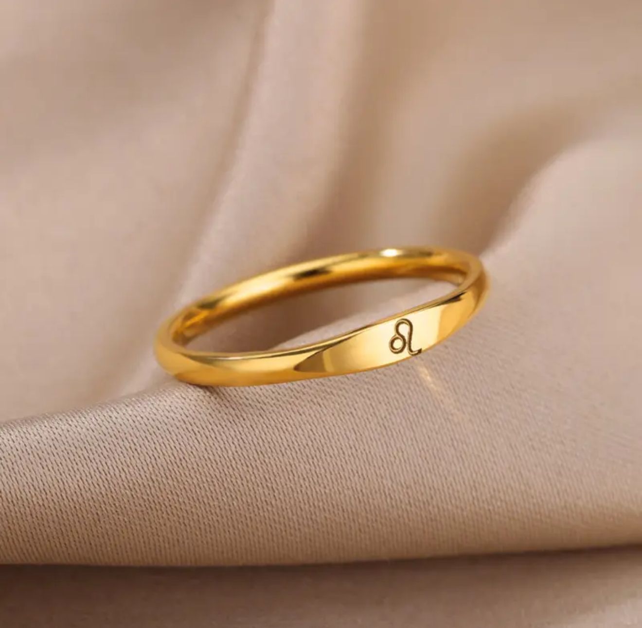 Celestial Zodiac Ring — A celestial work of art symbolizing harmony between spirit and intellect. Crafted in golden stainless steel with engraved zodiac Celestial Zodiac Ring — A celestial work of art symbolizing harmony between spirit and intellect. Crafted in golden stainless steel with engraved zodiac