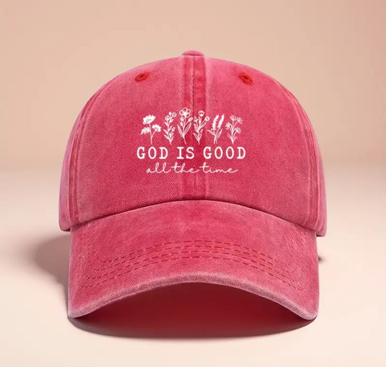 God Is Good Cap Crafted from soft, breathable fabric with a retro-washed finish, this adjustable floral snapback honors the message “God Is Good.”