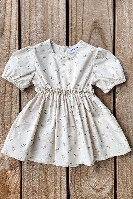 girl&#39;s beige floral dress