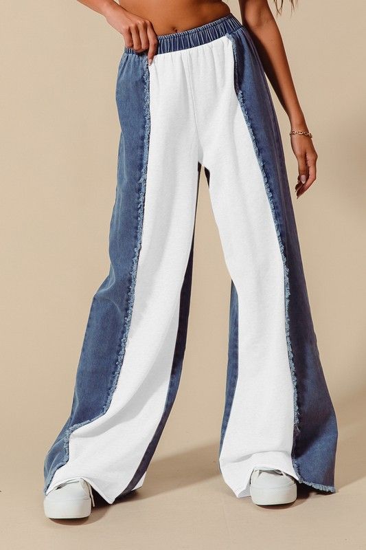 Distressed denim pants