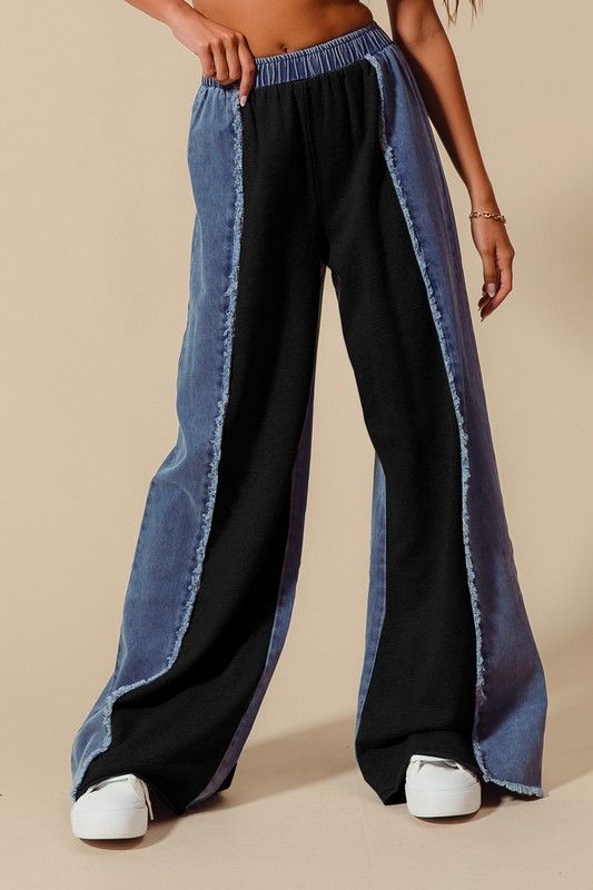 Distressed denim pants
