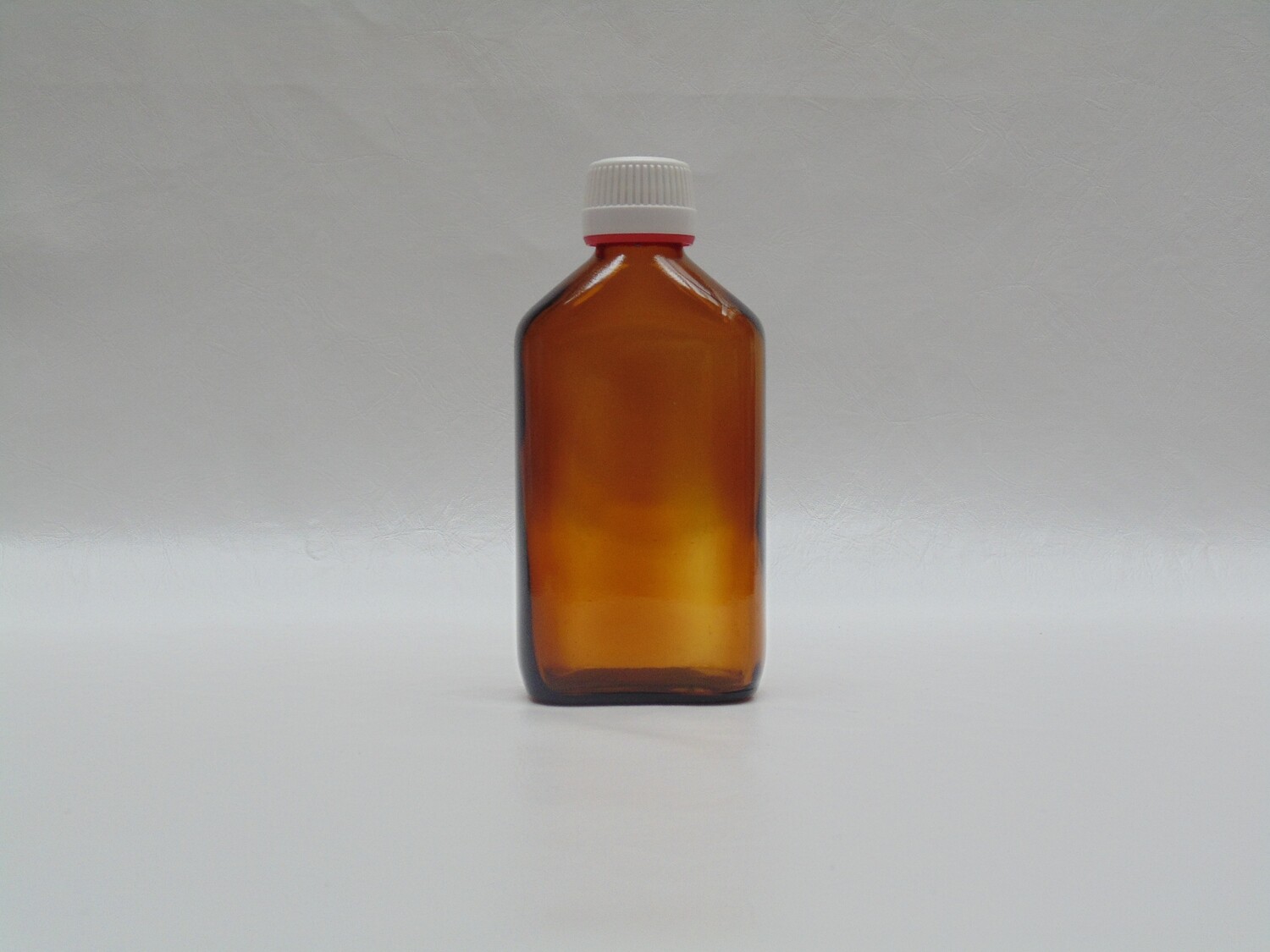 frasco plano vidrio topacio rosca PP28 225 ml con tapón inviolable blanco/rojo