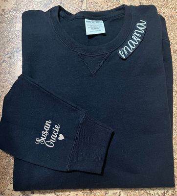 Curved neckline embroidered sweatshirt