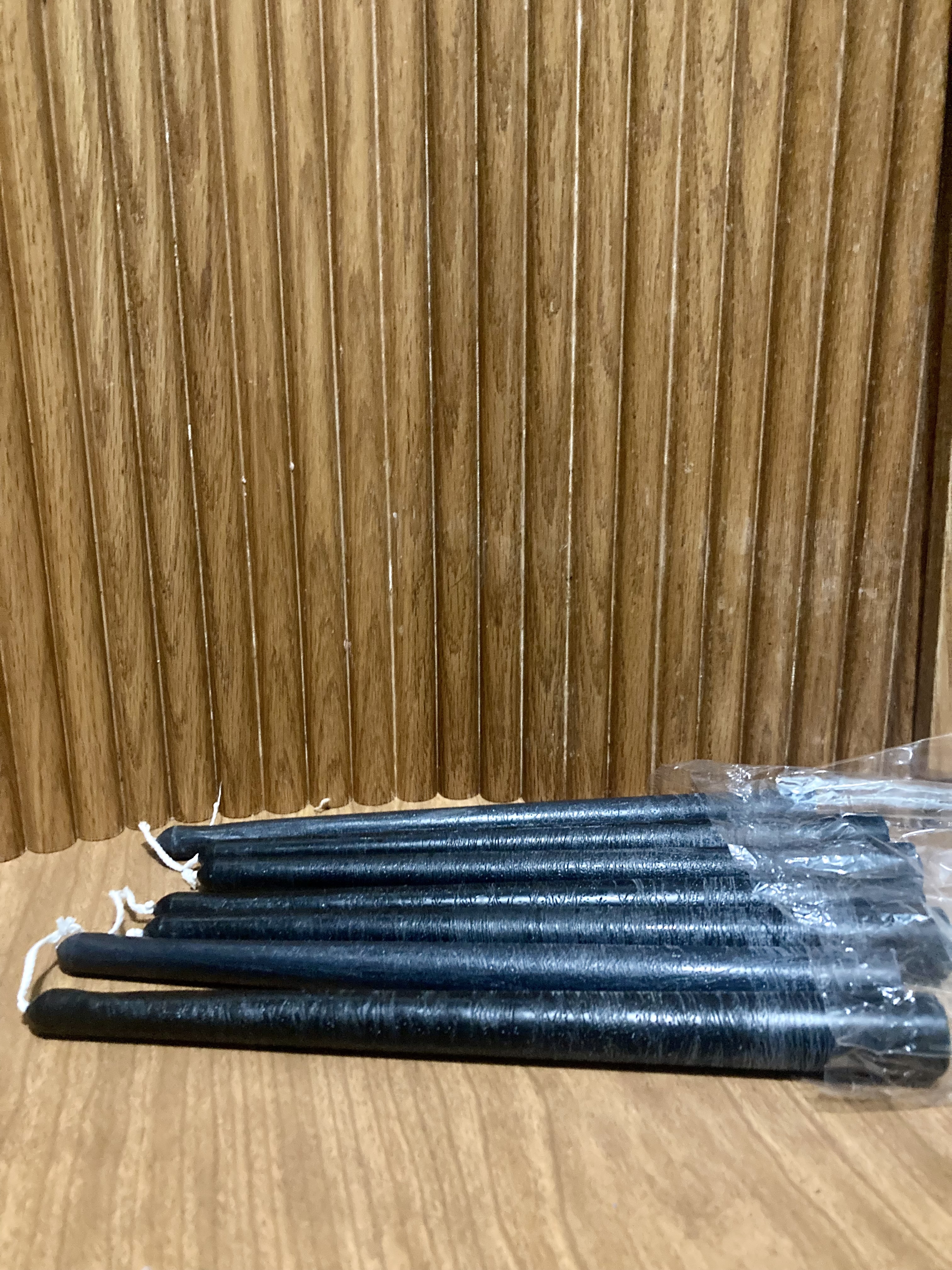 7 black taper candles