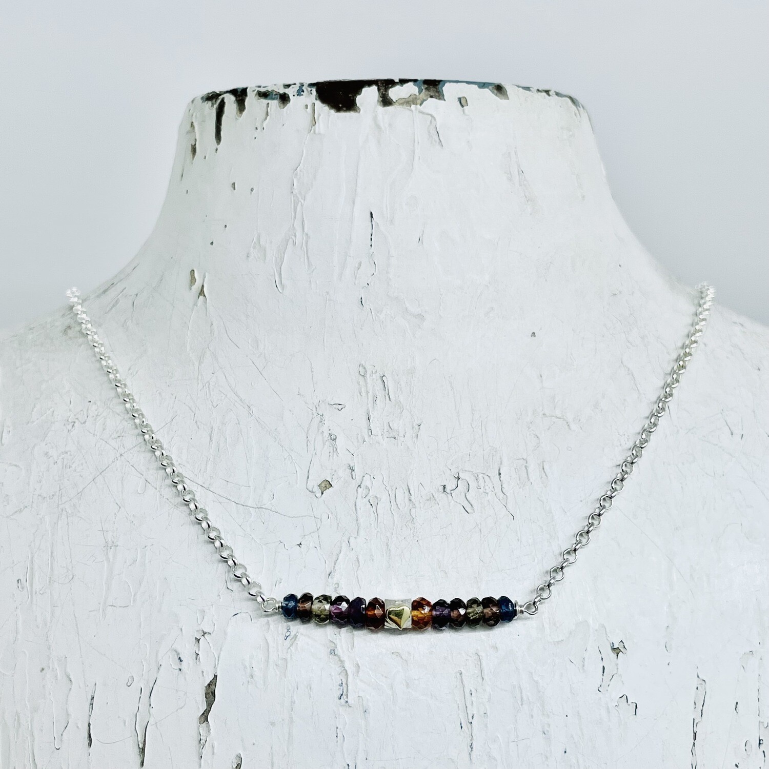 Handmade Necklace with multi sapphire, faceted silver with brass heart