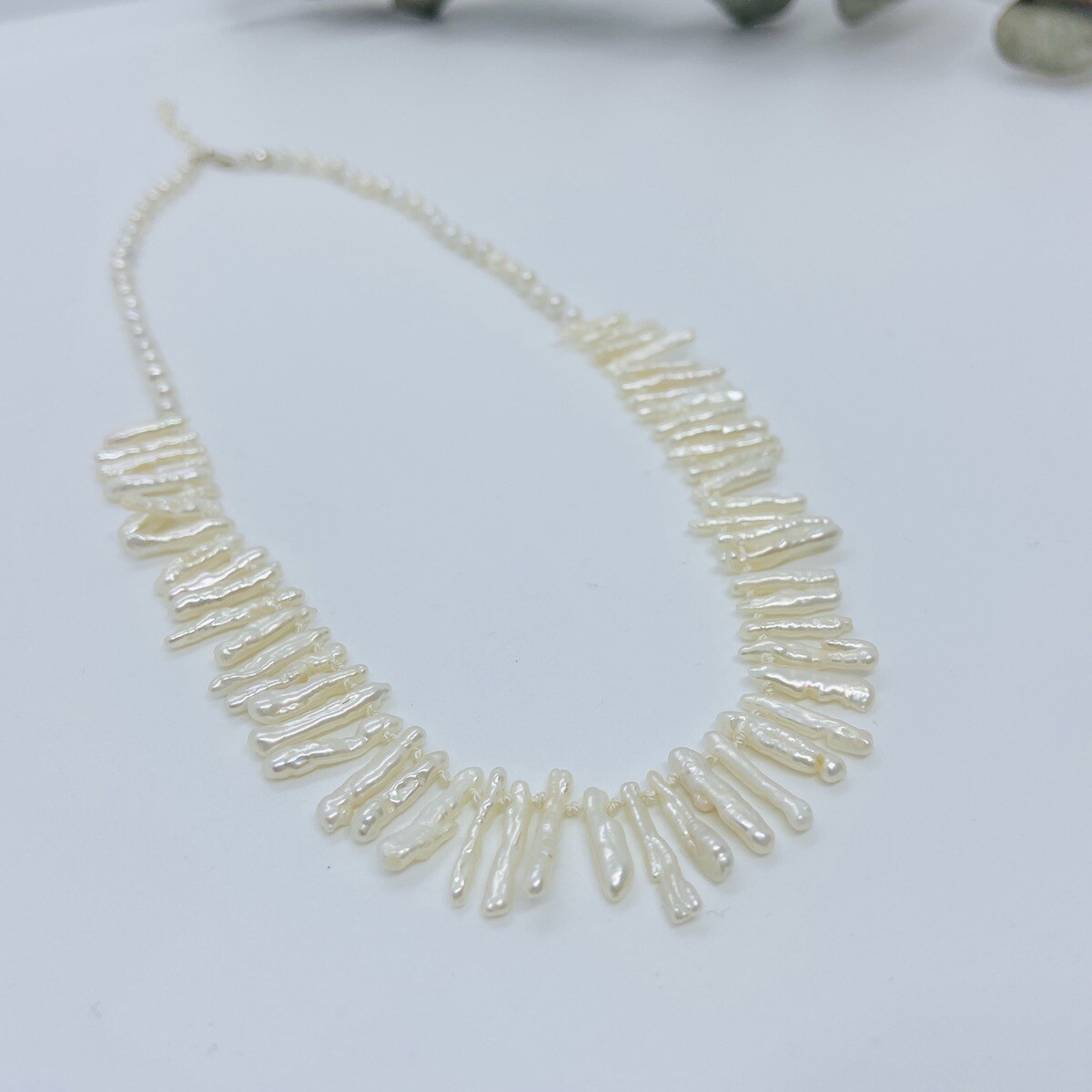 Handmade Necklace with white stick pearls, round knotted on white silk