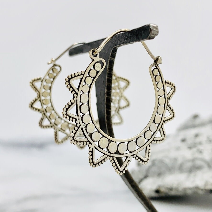 Sterling silver starburst hoop earring