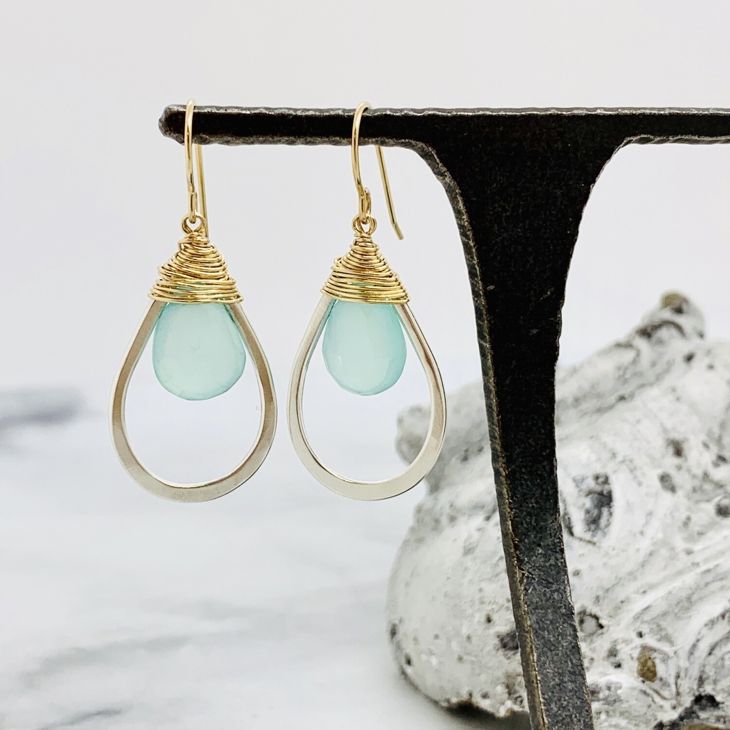 Handmade earrings with faceted aqua chalcedony wrapped in 14k gf and hanging in sterling teardrop