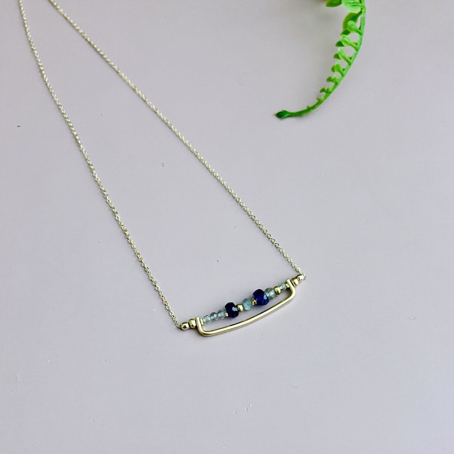 Handmade 14k gold filled bar with faceted blue sapphire and labradorite necklace. 16&quot; L