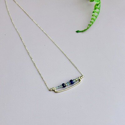 Handmade 14k gold filled bar with faceted blue sapphire and labradorite necklace. 16" L