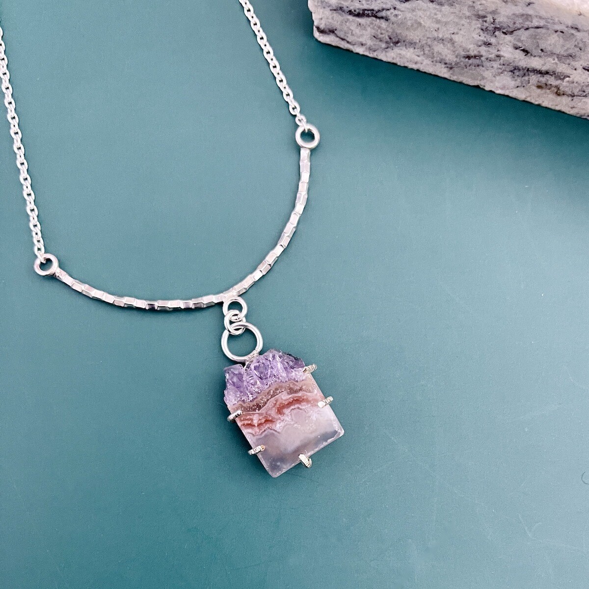Handmade Necklace with prong set amethyst slice, textured curved bar