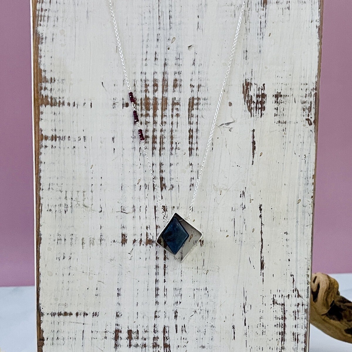 Handmade Necklace with ruby in kyanite kyanite in diamond shaped silver, stations of rubies