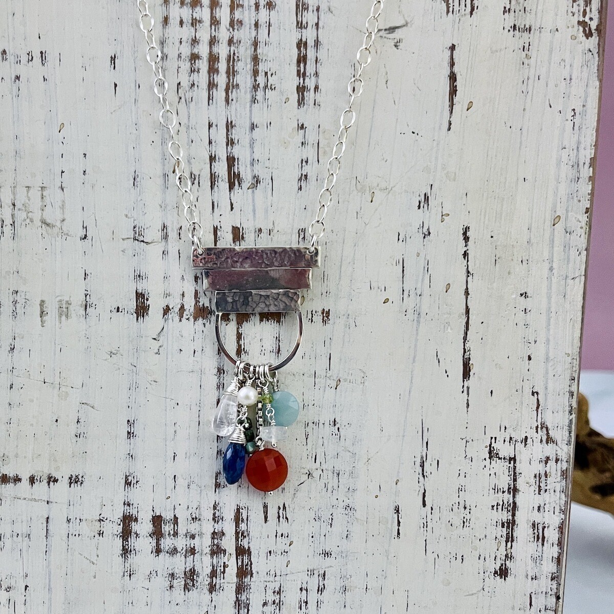 Handmade Necklace with 2 hammered, 1 shiny bar with loop, carnelian coin, kyanite marquise, amazonite coin, stack turquoise, rose quartz, rainbow moonstone