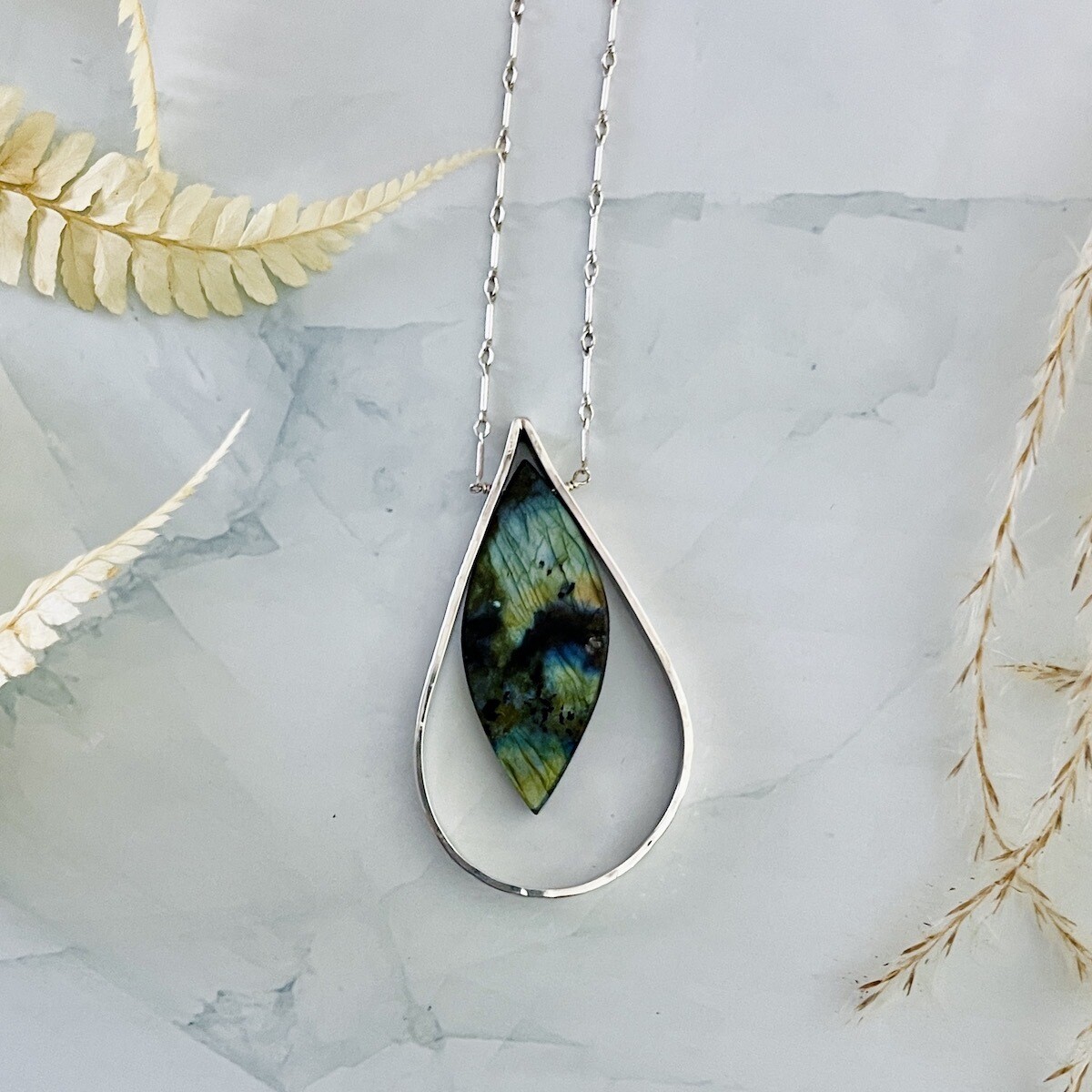 Handmade Necklace with marquise labradorite, wide hammered silver teardrop