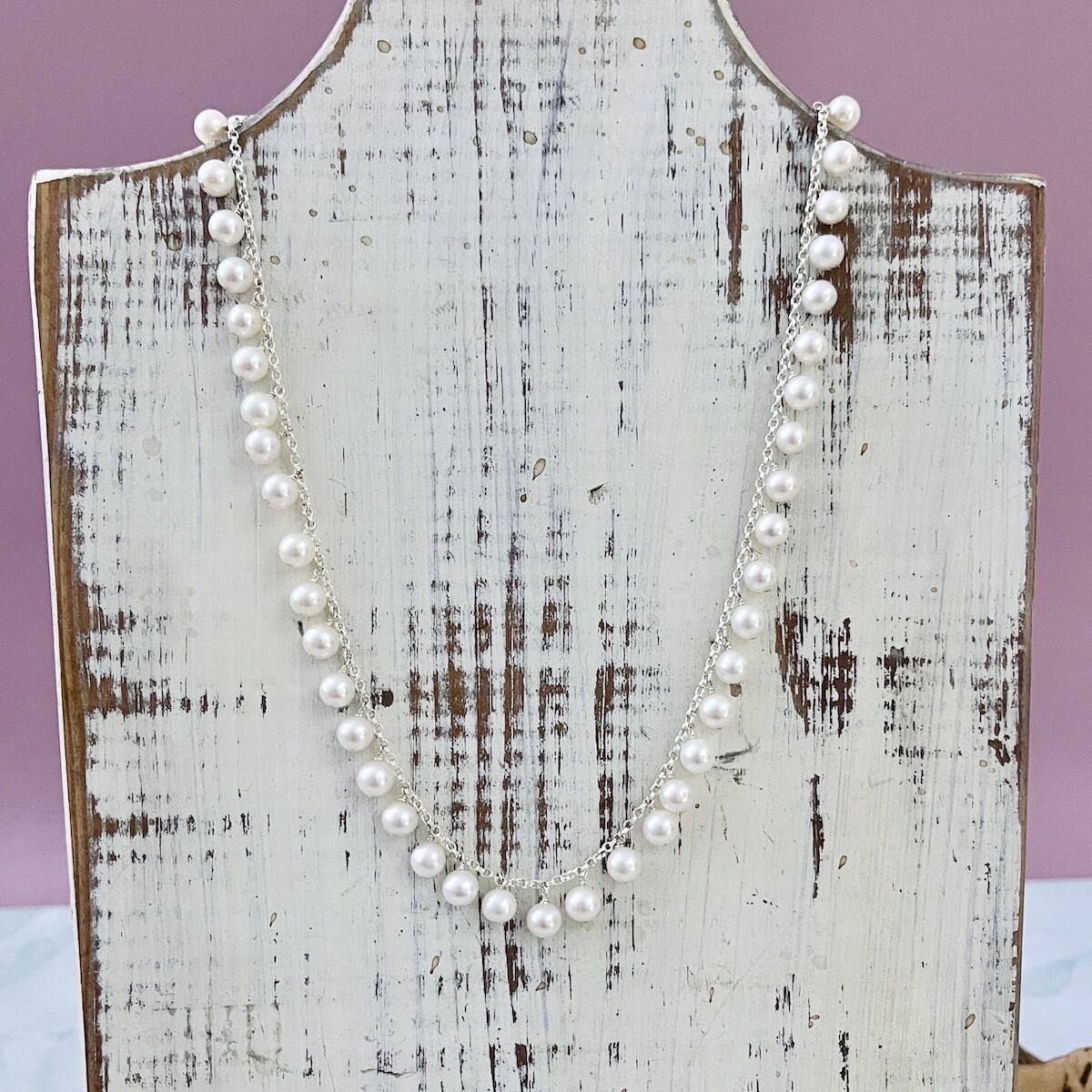 Handmade Necklace with smaller white pearls all the way around