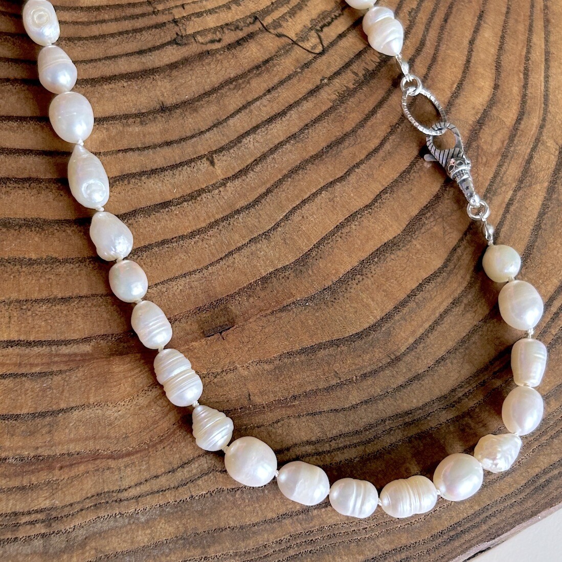 Handmade Silver Necklace with white baroque pearls knotted on white silk, skull lobster clasp