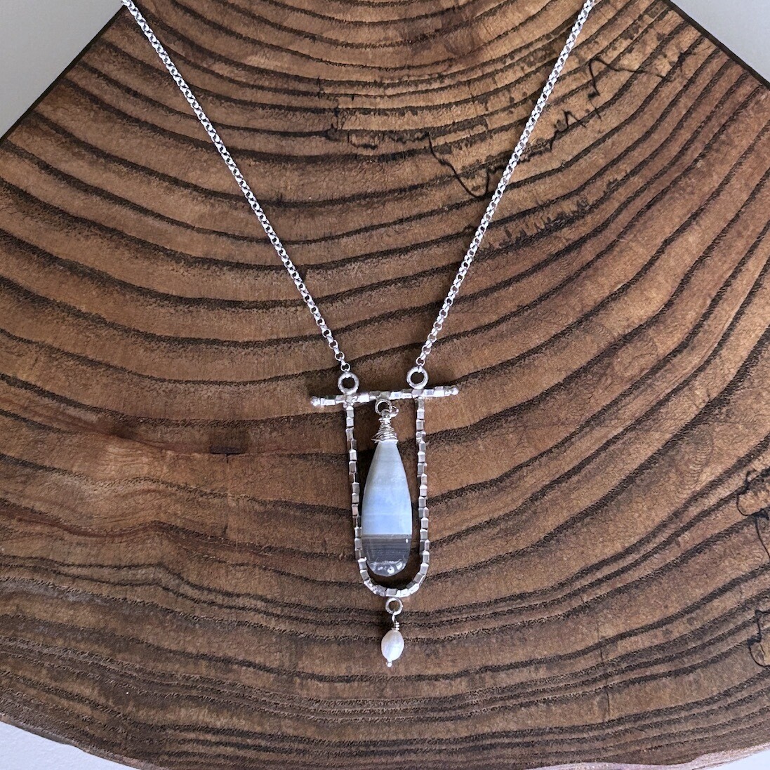 Handmade Silver Necklace with textured u with bar, blue opal, white pearl